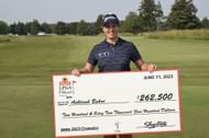Ashleigh Buhai poses for a photo with a check after winning the ShopRite LPGA Classic 2023